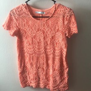 Peach colored shirt
